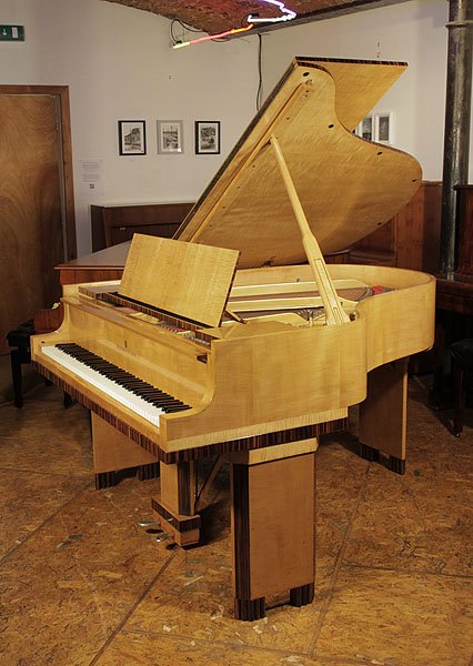 Art-Deco style, restored, 1932, Steinway Model M grand piano for sale with a crossbanded, maple and coromandel case. Cabinet features strong geometric styling