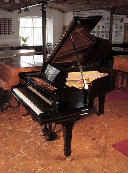 Rebuilt, 1910, Steinway Model O grand piano for sale with a black case and spade legs. Piano has an eighty-eight note keyboard and a two-pedal lyre. 