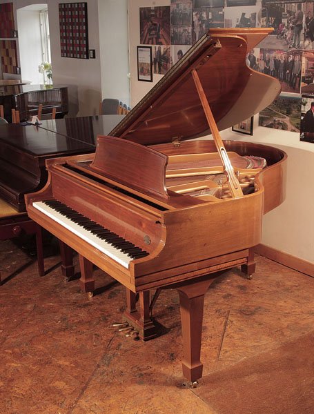 Crown Jewel Collection, 1997, Steinway Model S baby grand piano for sale with a polished, walnut case and spade legs Piano has an eighty-eight note keyboard and a three-pedal lyre.