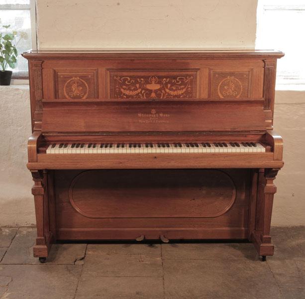 A 1904, Steinway upright piano for sale with a polished, rosewood case and inlaid panels in a Neoclassical design